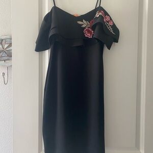 Black figure hugging dress